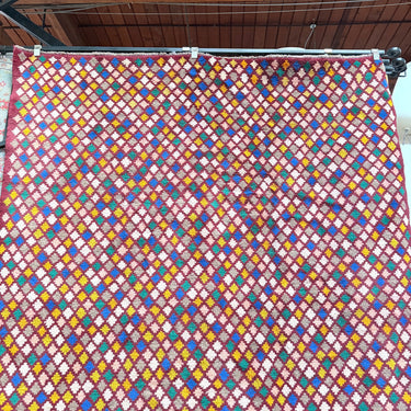 Vibrant Geometric Oriental Carpet in Deep Red Tones