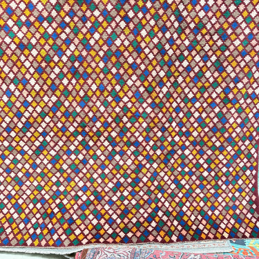 Vibrant Geometric Oriental Carpet in Deep Red Tones