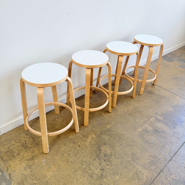 Artek Alvar Aalto Counter Stools 64 with white laminate seats