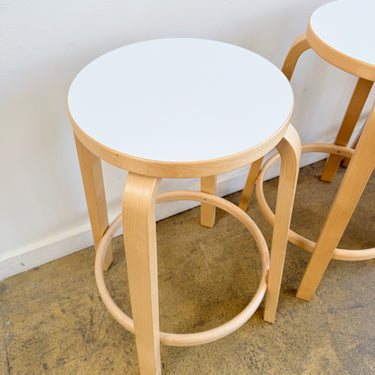 Artek Alvar Aalto Counter Stools 64 with white laminate seats