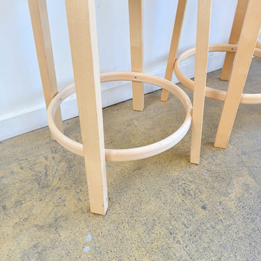Artek Alvar Aalto Counter Stools 64 with white laminate seats
