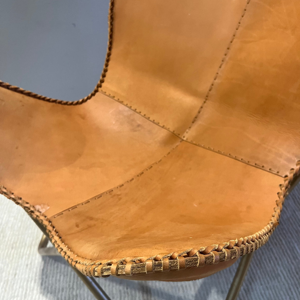 CB2 Tobaco leather butterfly chair