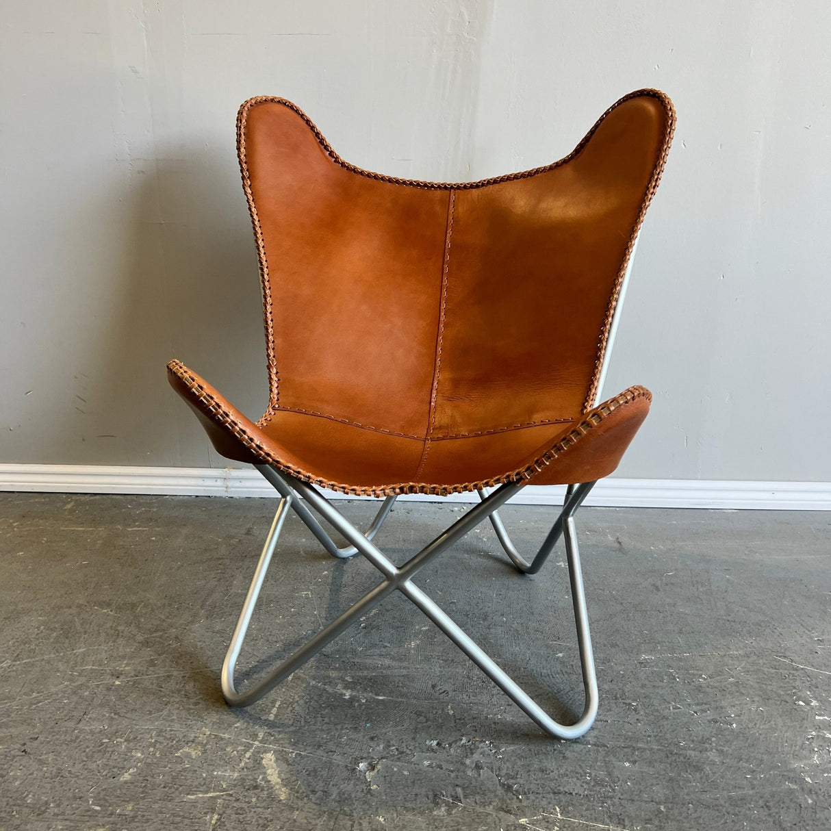 CB2 1938 tobacco leather butterfly chair - enliven mart